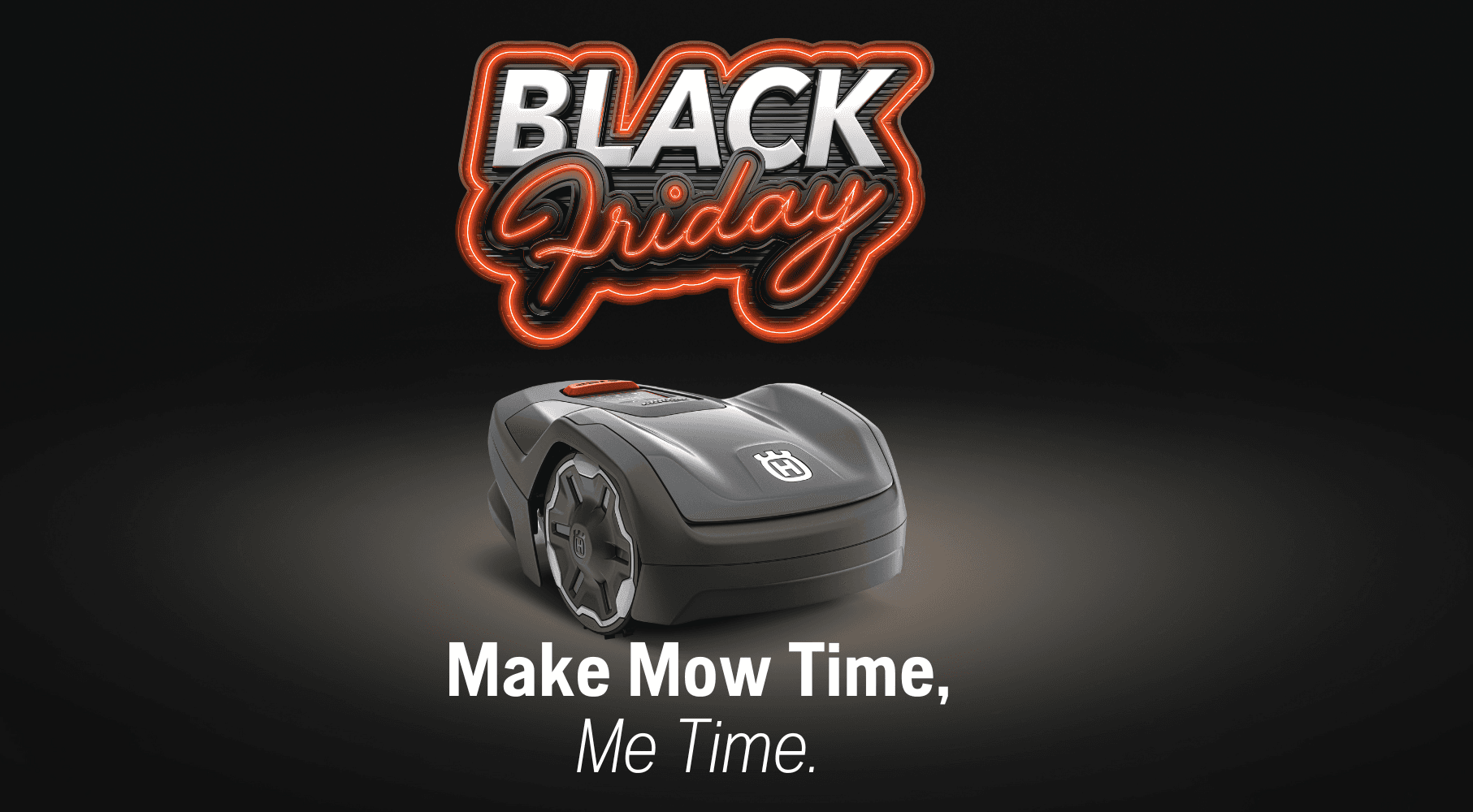 Automower working on downhill in a backyard with a house in the background